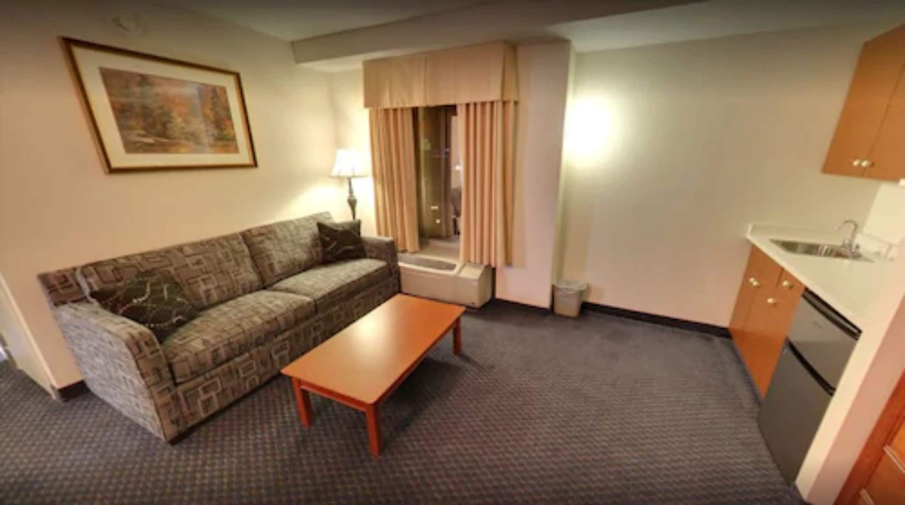 suite, 1 bedroom (2 queen beds and 1 sofa bed) | desk, blackout curtains, iron/ironing board, free cots/infant beds