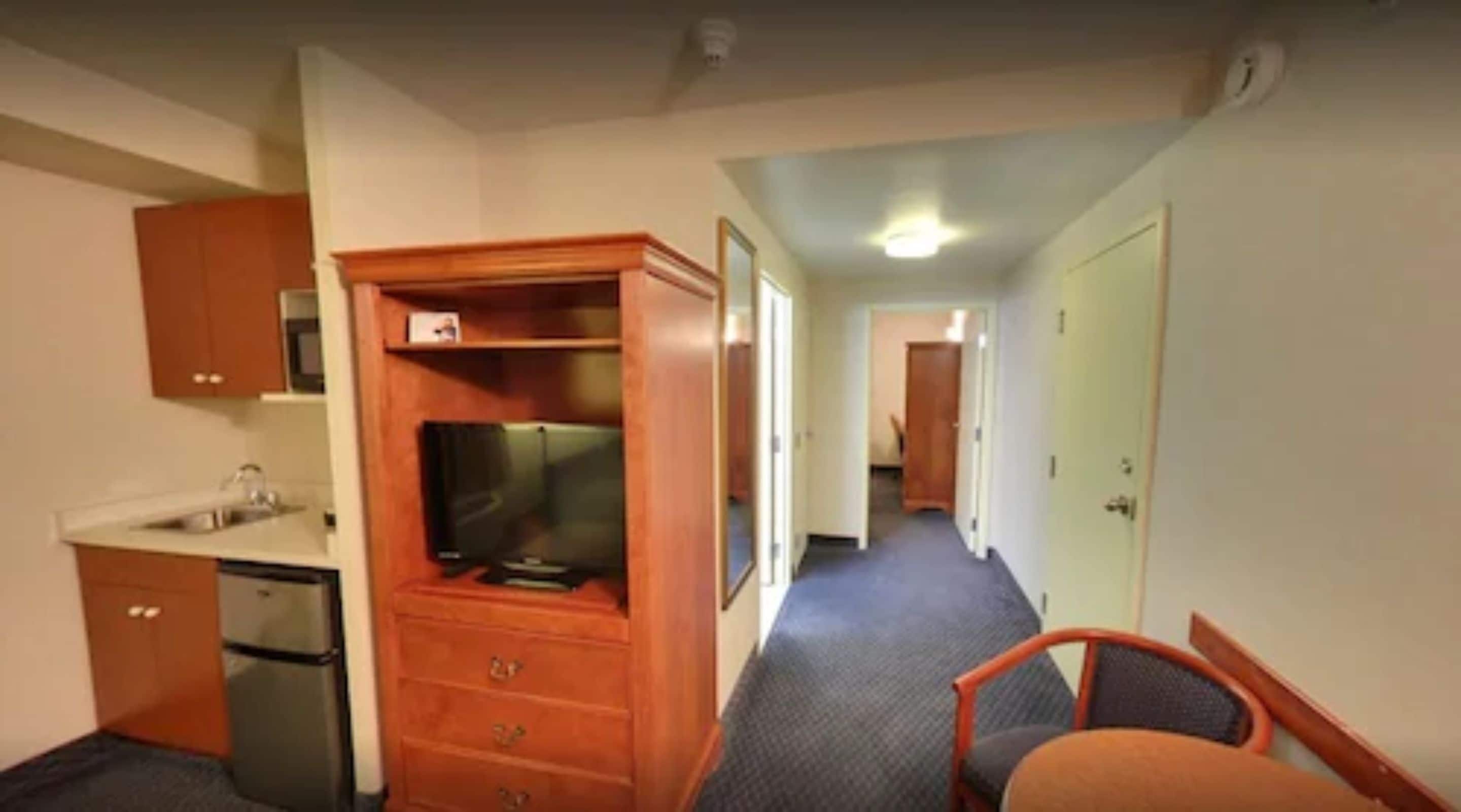 suite, 1 bedroom (1 king bed with sofa bed) | desk, blackout curtains, iron/ironing board, free cots/infant beds