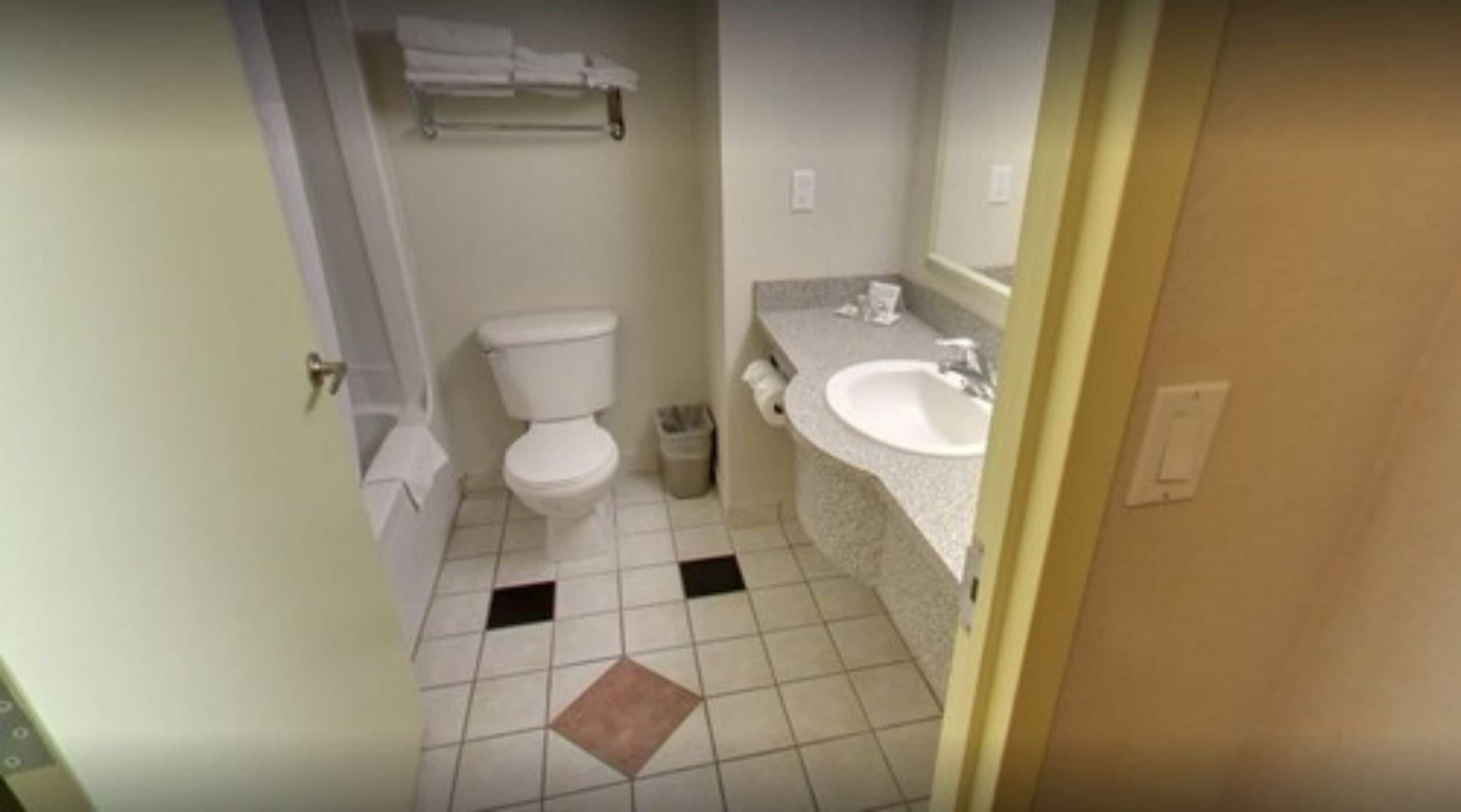 standard room, 2 queen beds | bathroom | free toiletries, hair dryer, towels