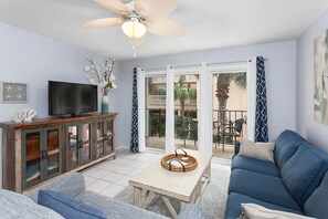 Condo, 2 Bedrooms | Living area | 35-inch flat-screen TV with cable channels, TV, DVD player - Hodnett Cooper's Beach Club (St. Simons Island)