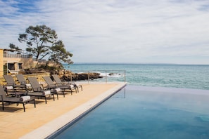 Indoor pool, seasonal outdoor pool, pool umbrellas, sun loungers