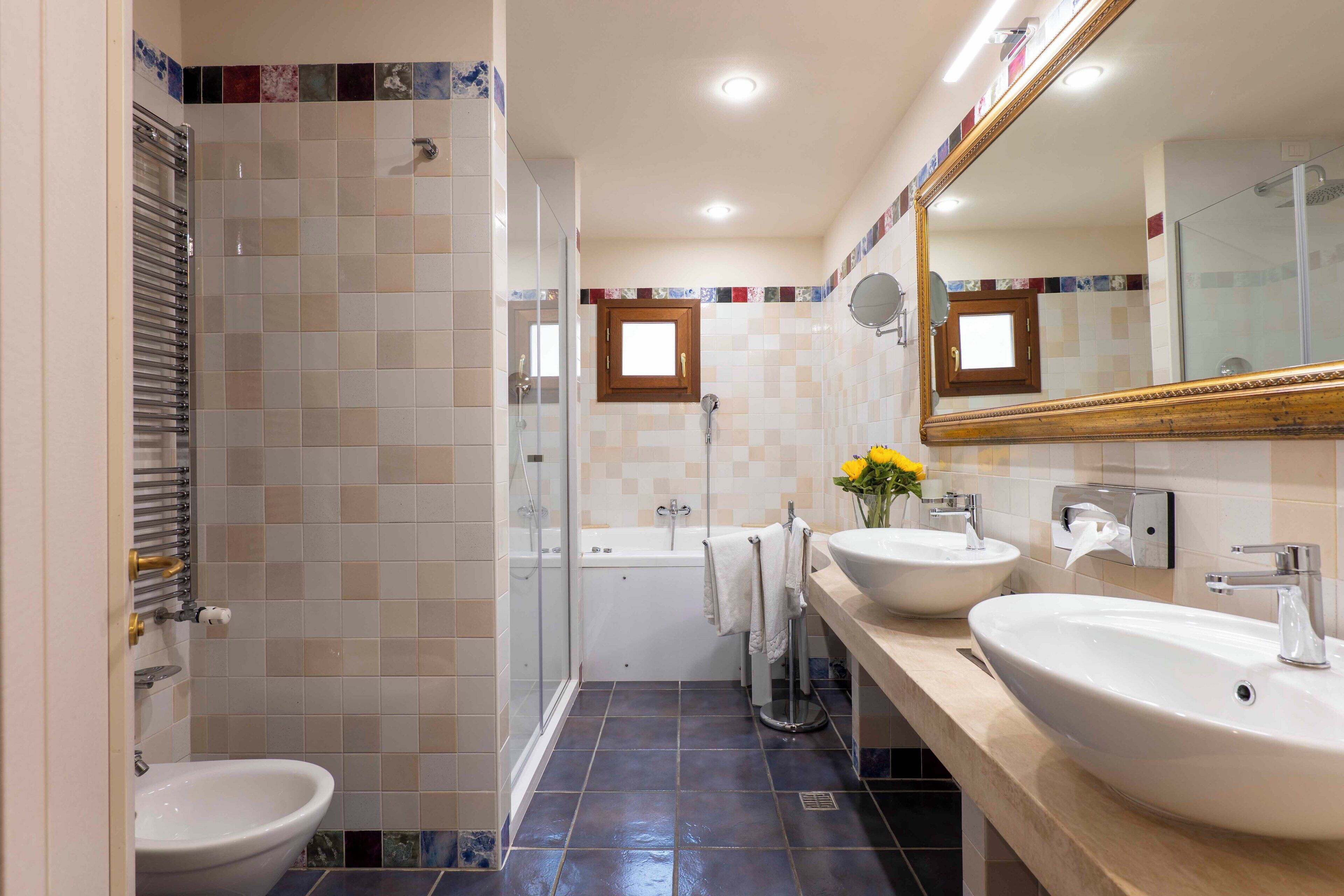 suite | bathroom | designer toiletries, hair dryer, bathrobes, bidet
