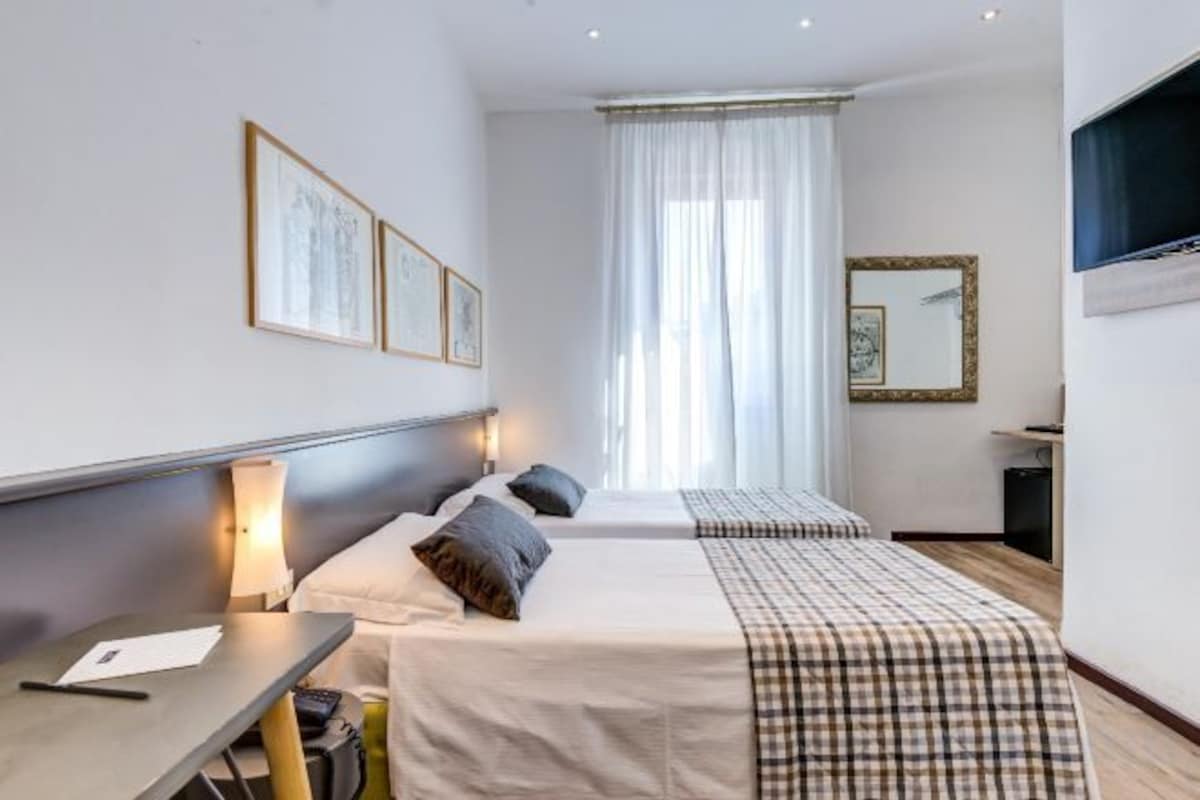In-room safe, desk, WiFi (free), bed sheets