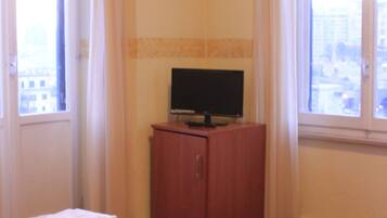 Desk, laptop workspace, free WiFi, bed sheets