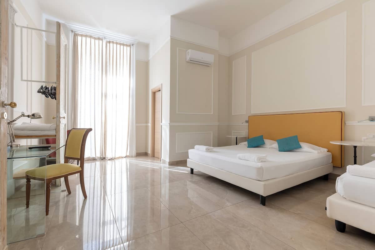 Family Room | Premium bedding, in-room safe, desk, soundproofing