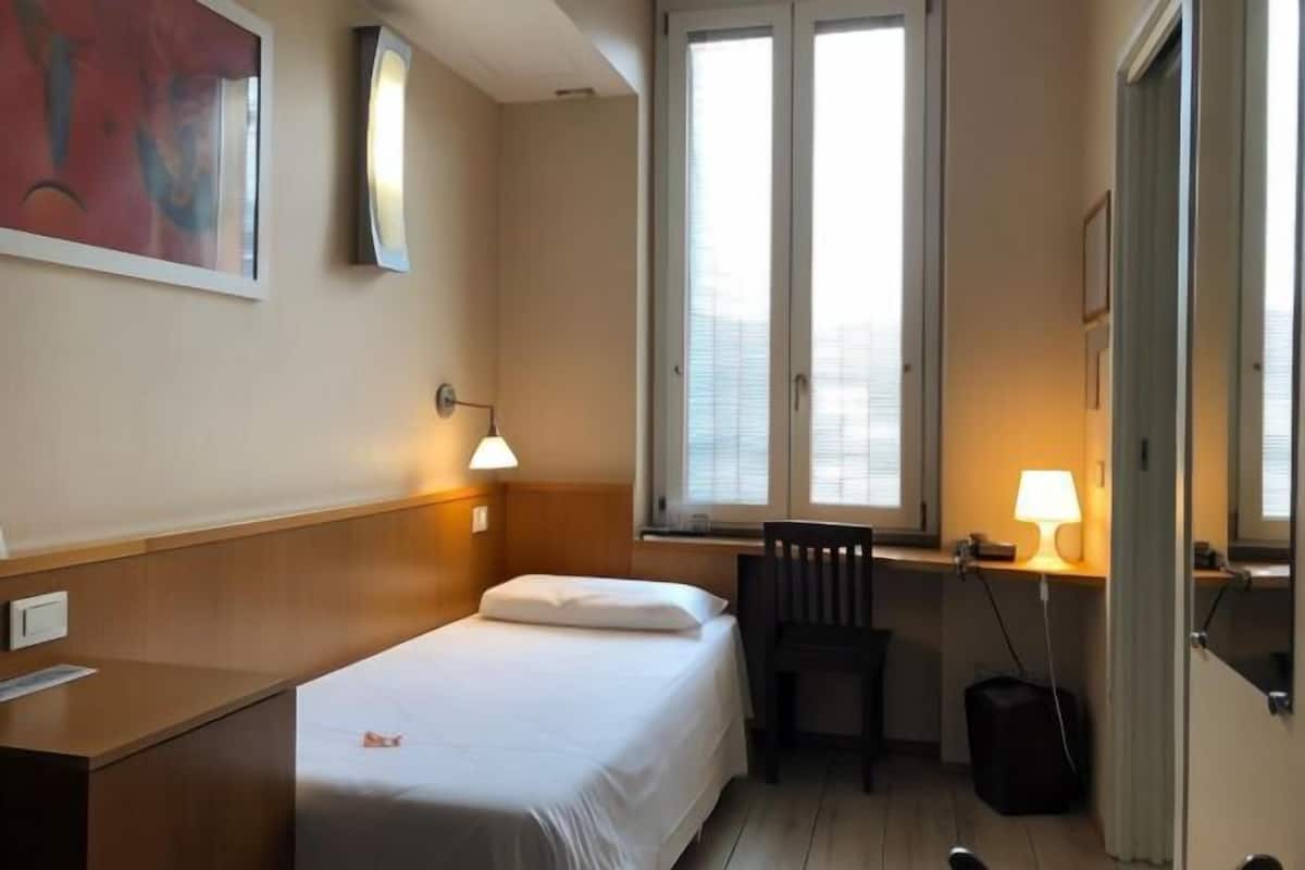 Hypo-allergenic bedding available, memory foam beds, minibar