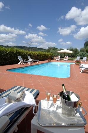 Seasonal outdoor pool, pool umbrellas