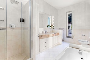 Deluxe Room | Bathroom | Designer toiletries, hair dryer, slippers, bidet