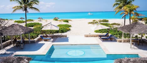 Outdoor pool, pool umbrellas, sun loungers