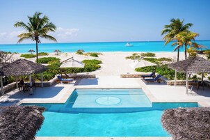 Outdoor pool, pool umbrellas, sun loungers