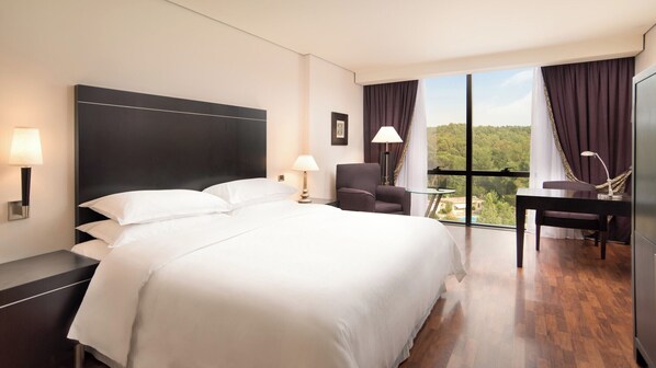 Hypo-allergenic bedding, down duvets, minibar, in-room safe