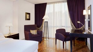 Hypo-allergenic bedding, down duvets, minibar, in-room safe