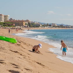 On the beach, sun-loungers