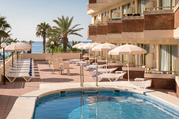 2 outdoor pools, pool umbrellas, sun loungers