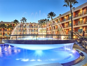 Indoor pool, outdoor pool, pool umbrellas, sun loungers