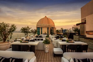 Rooftop bar, ocean views, open daily