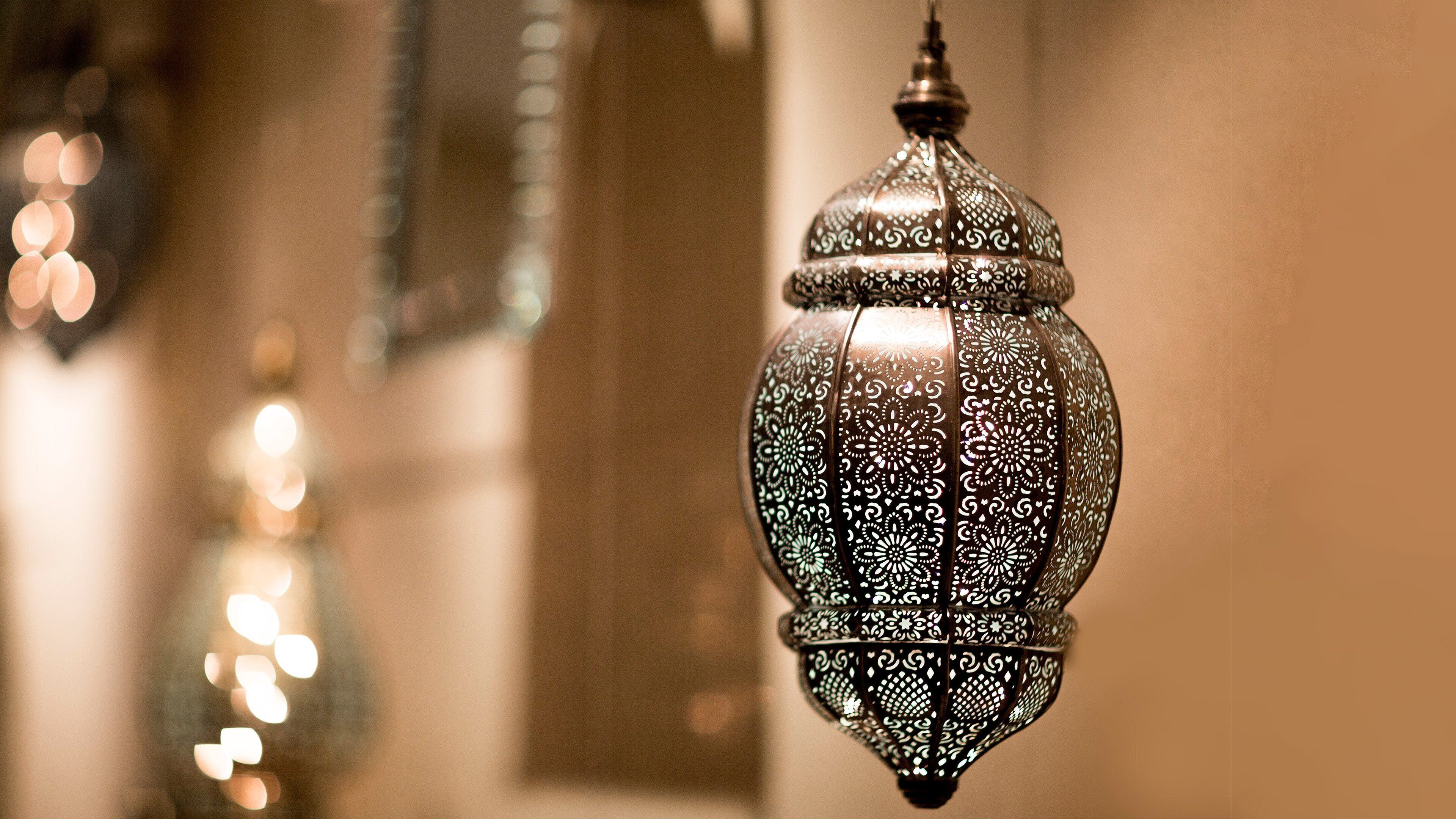 A hanging lantern with intricate patterns.