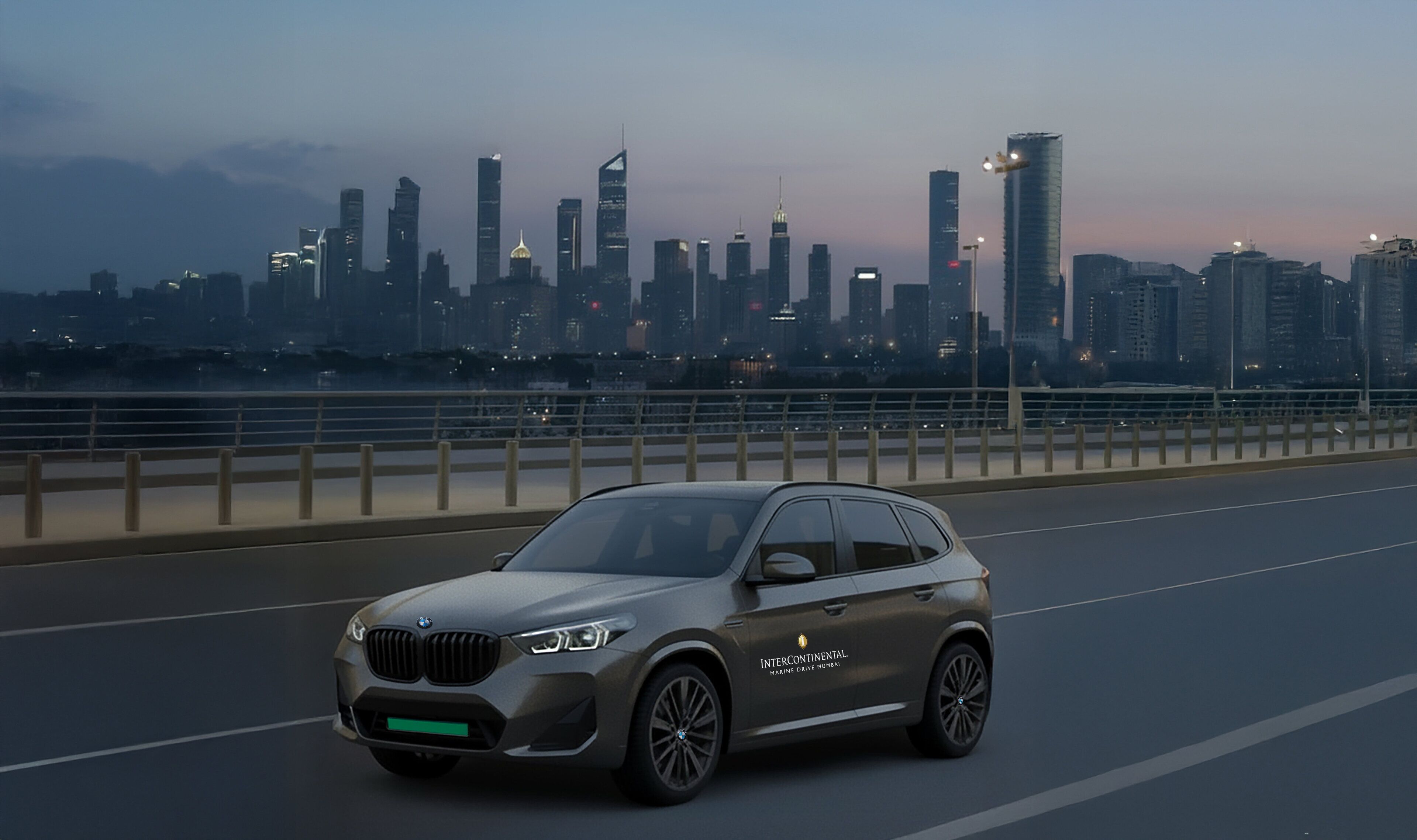 A BMW SUV on a bridge with a city skyline in the background.