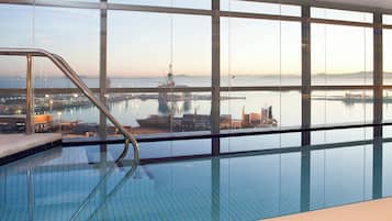 Indoor pool, outdoor pool, open 6:00 AM to 10:00 PM, pool umbrellas
