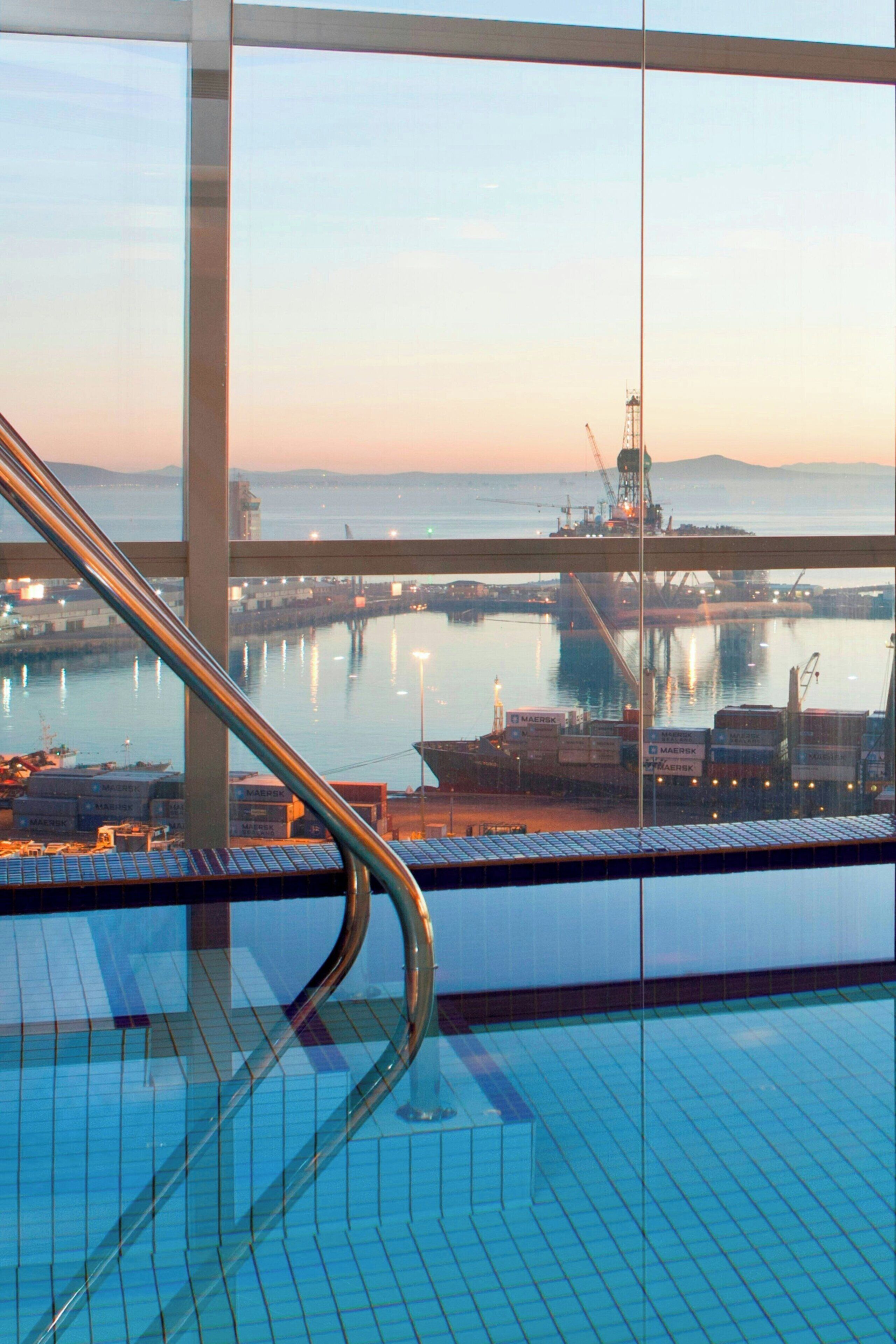 indoor pool, outdoor pool, open 6:00 am to 10:00 pm, pool umbrellas