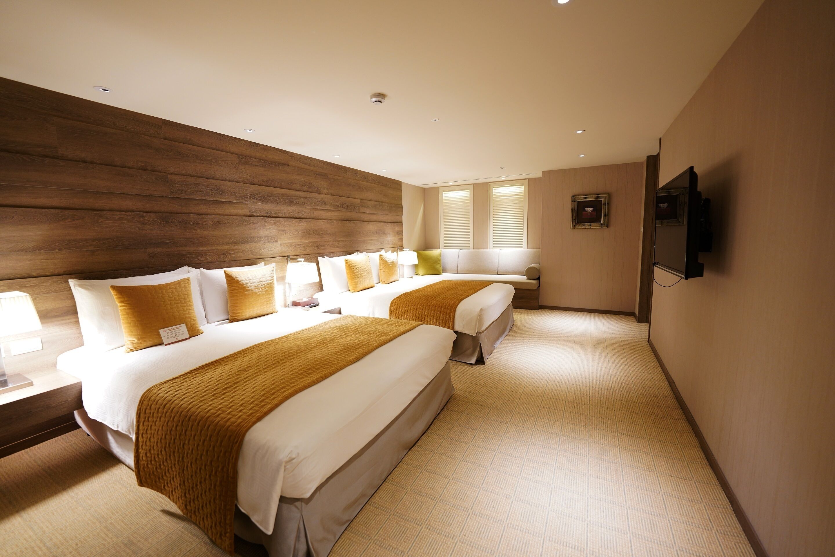 deluxe family suite (no windows) | in-room safe, desk, blackout curtains, iron/ironing board