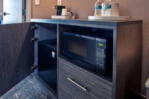 Premium bedding, down comforters, pillowtop beds, in-room safe