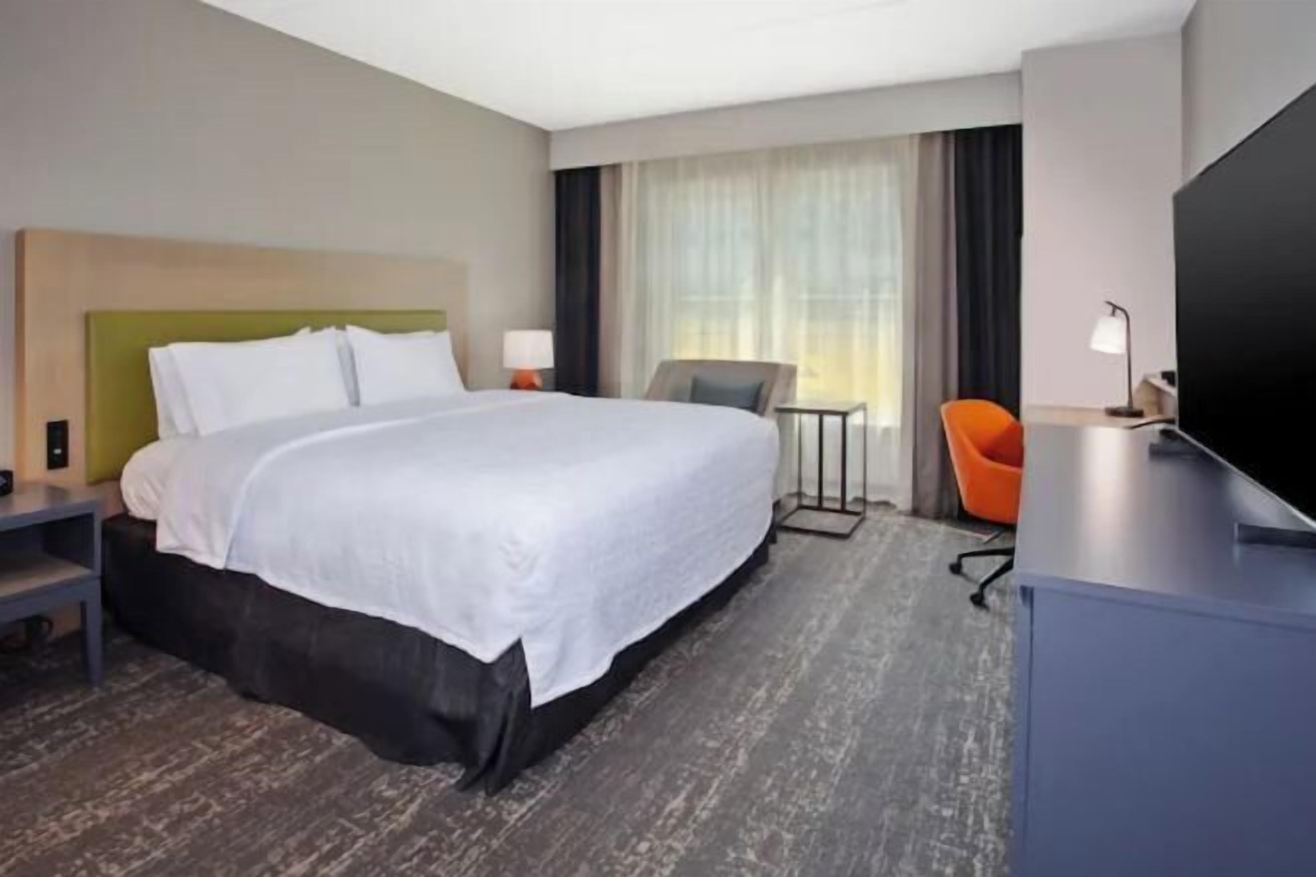 Premium bedding, down comforters, pillowtop beds, in-room safe