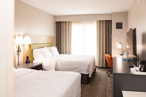 Premium bedding, down duvets, pillow-top beds, in-room safe
