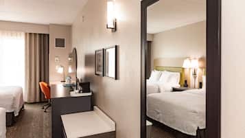 Premium bedding, down comforters, pillowtop beds, in-room safe