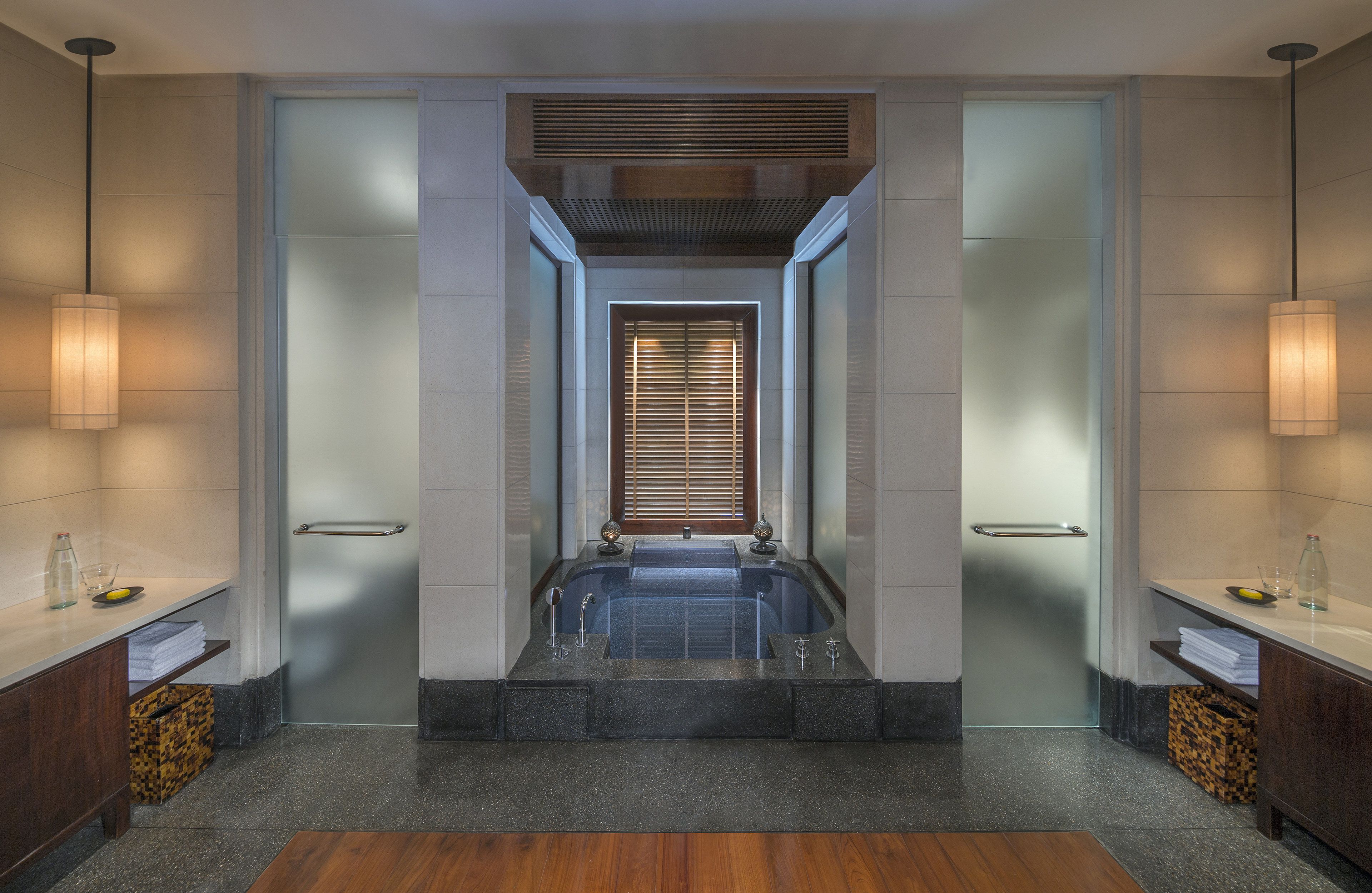 designer toiletries, hair dryer, bathrobes, slippers