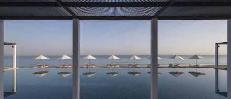 3 outdoor pools, open 8 AM to 6 PM, free cabanas, pool umbrellas