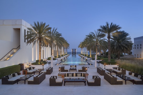 3 outdoor pools, open 8 AM to 6 PM, free cabanas, pool umbrellas