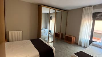 Blackout curtains, iron/ironing board, free WiFi, bed sheets