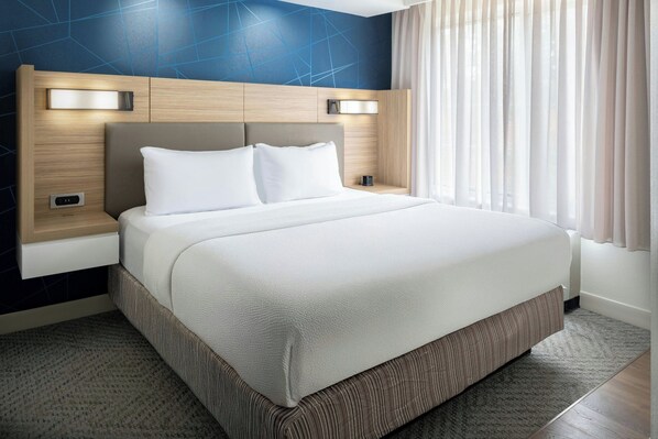 Premium bedding, in-room safe, desk, iron/ironing board