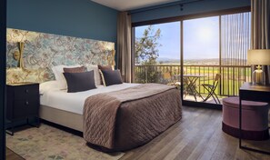 Luxe beddengoed, een minibar, een kluis op de kamer, een bureau