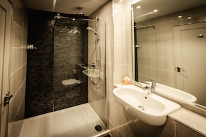 Shower, free toiletries, hair dryer, towels