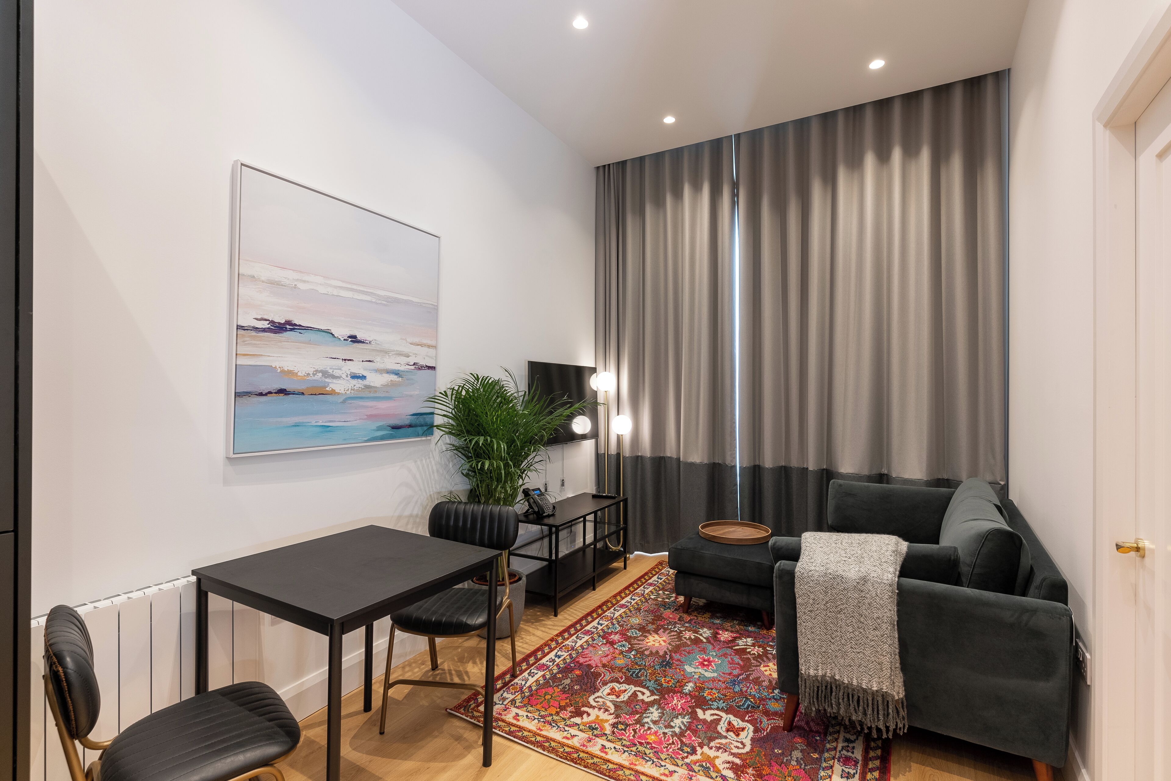 superior one bedroom apartment (located 150m from isaacs hotel) access by stairs only | living area | tv