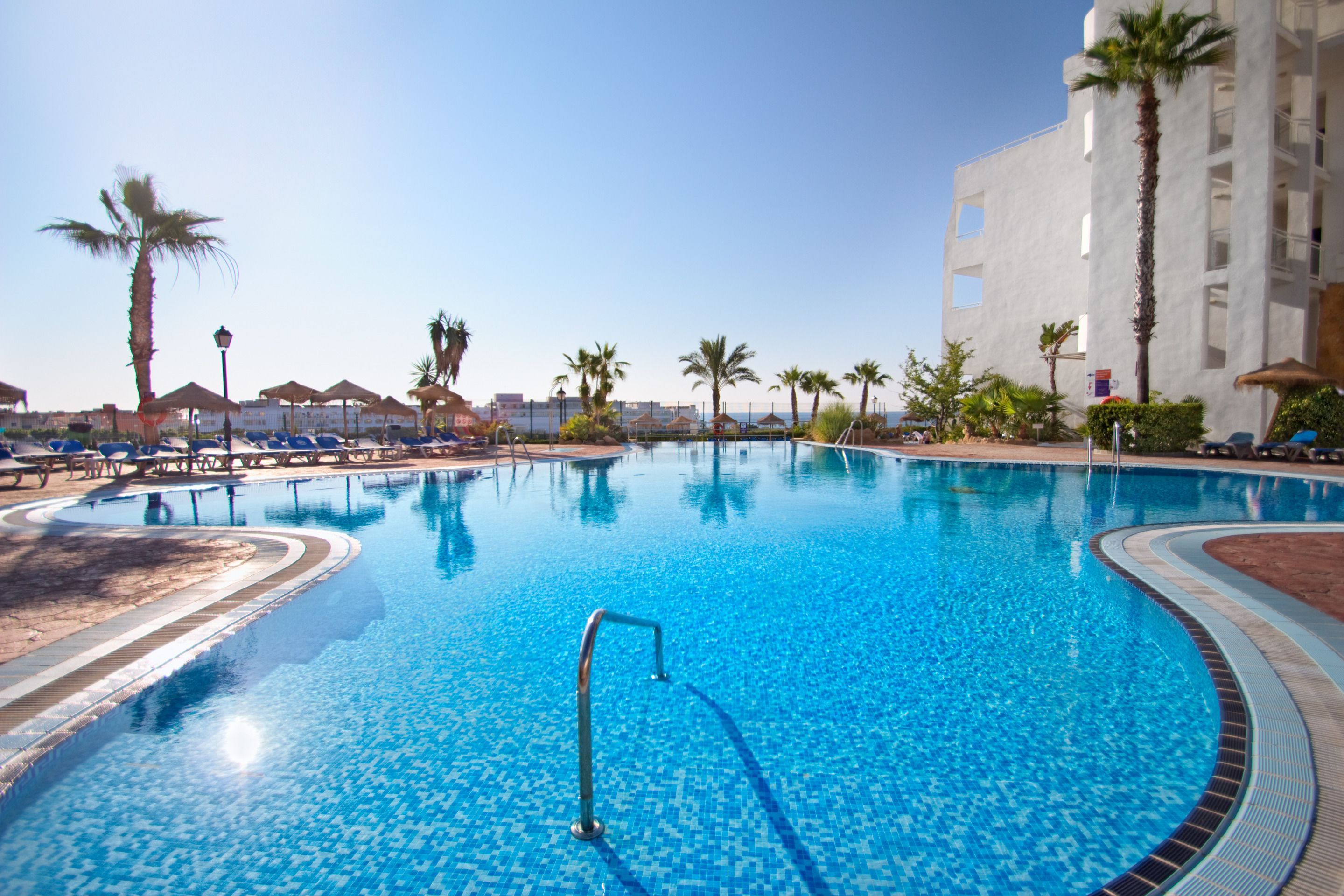 3 outdoor pools, pool loungers