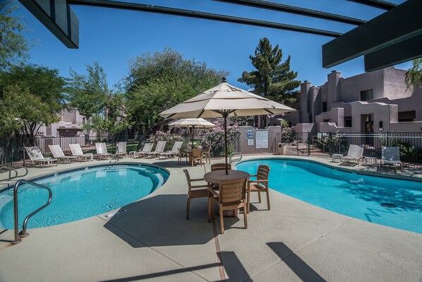 2 outdoor pools, pool umbrellas, pool loungers