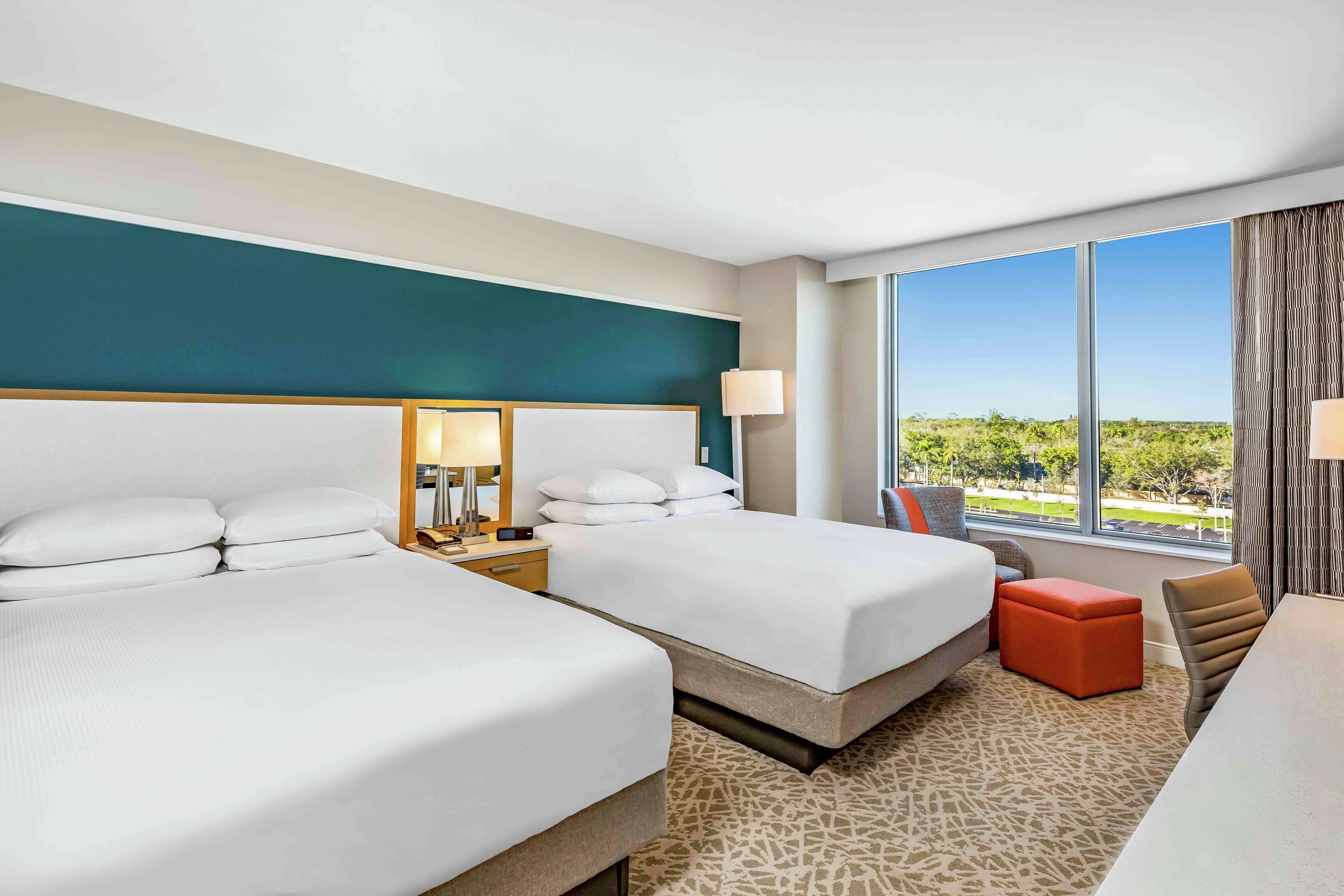 room, 2 queen beds | in-room safe, desk, laptop workspace, blackout curtains