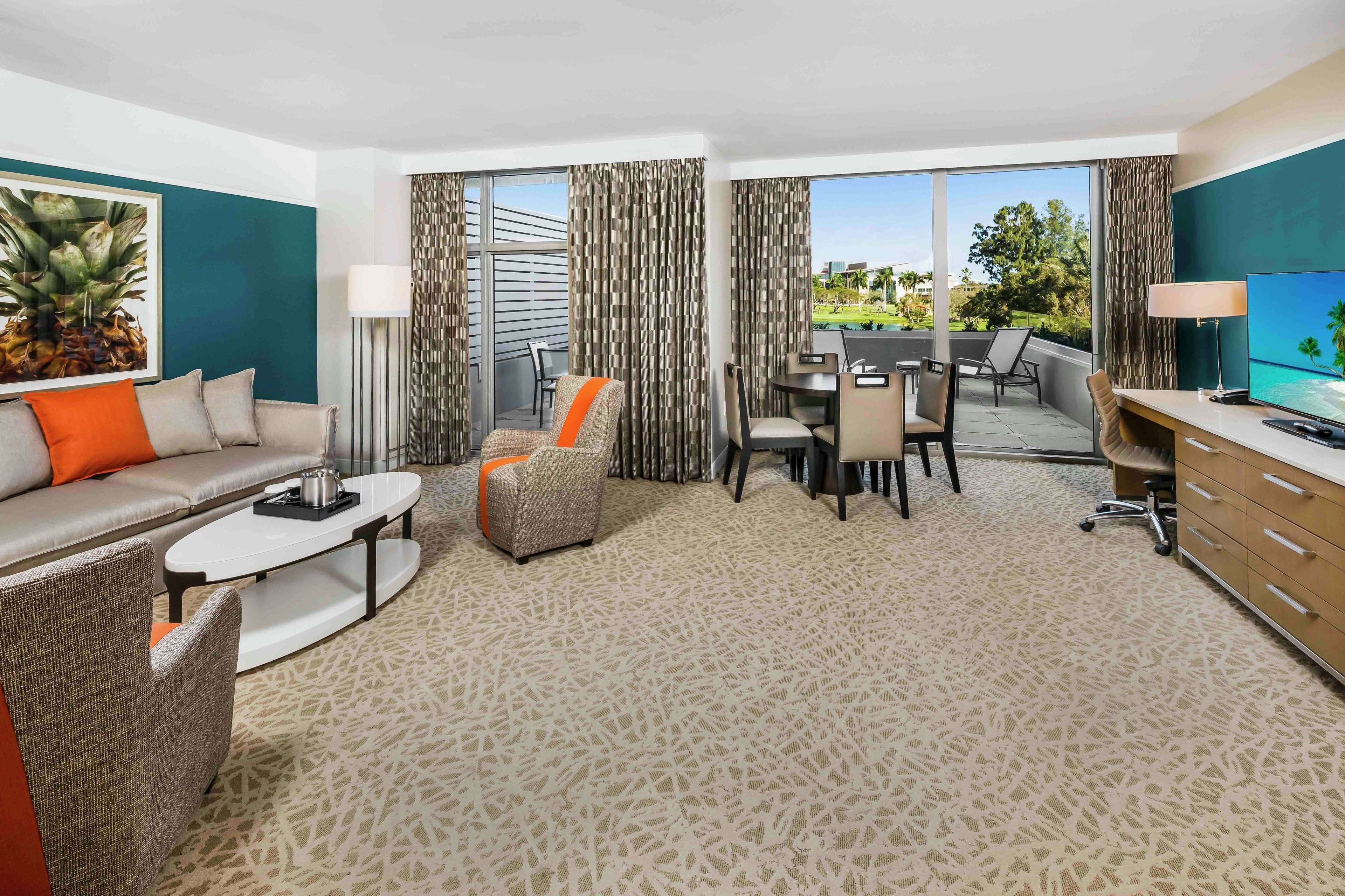 suite, 2 queen beds, terrace | living area | lcd tv, pay films