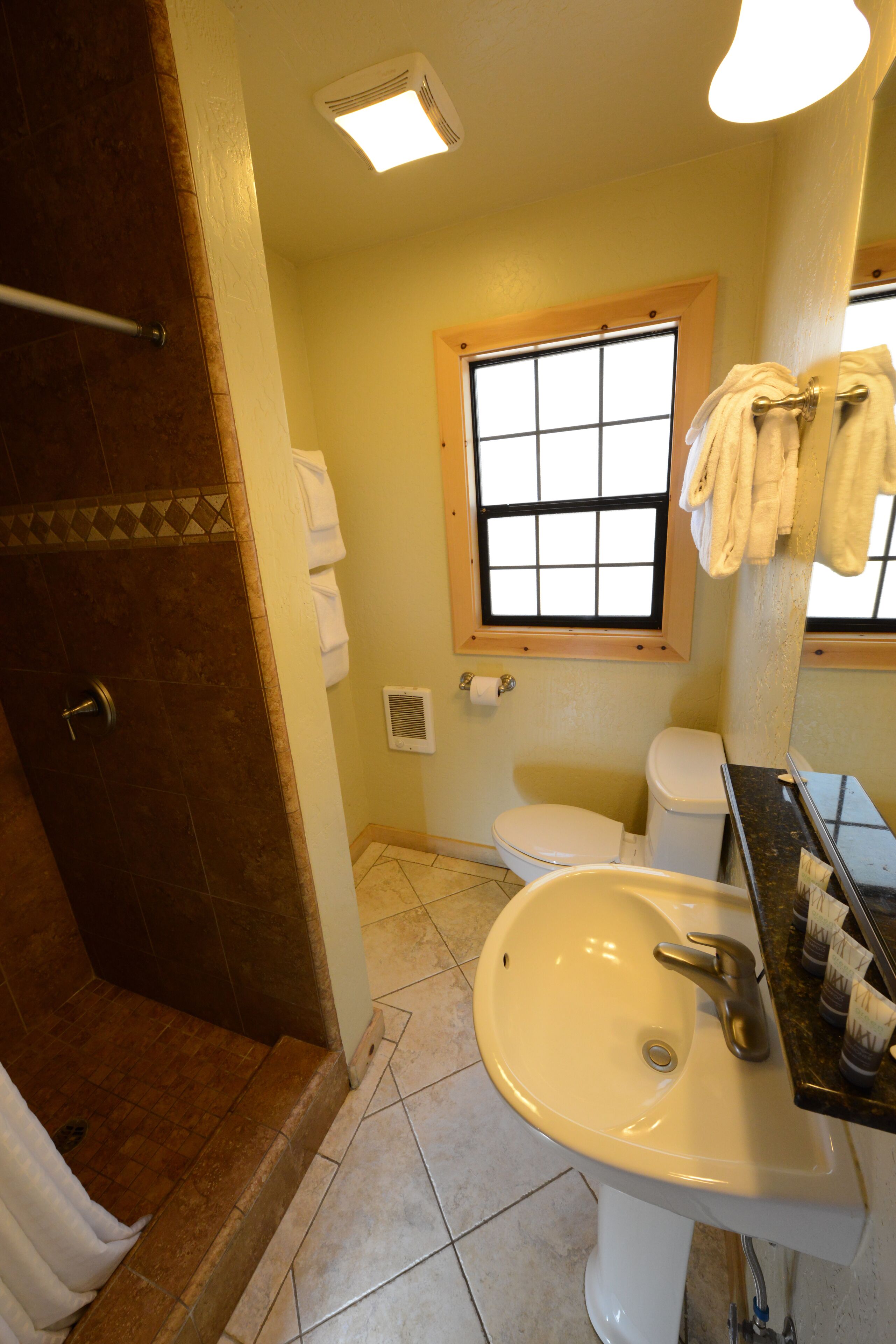 two story chalet | bathroom | free toiletries, hair dryer, towels, soap