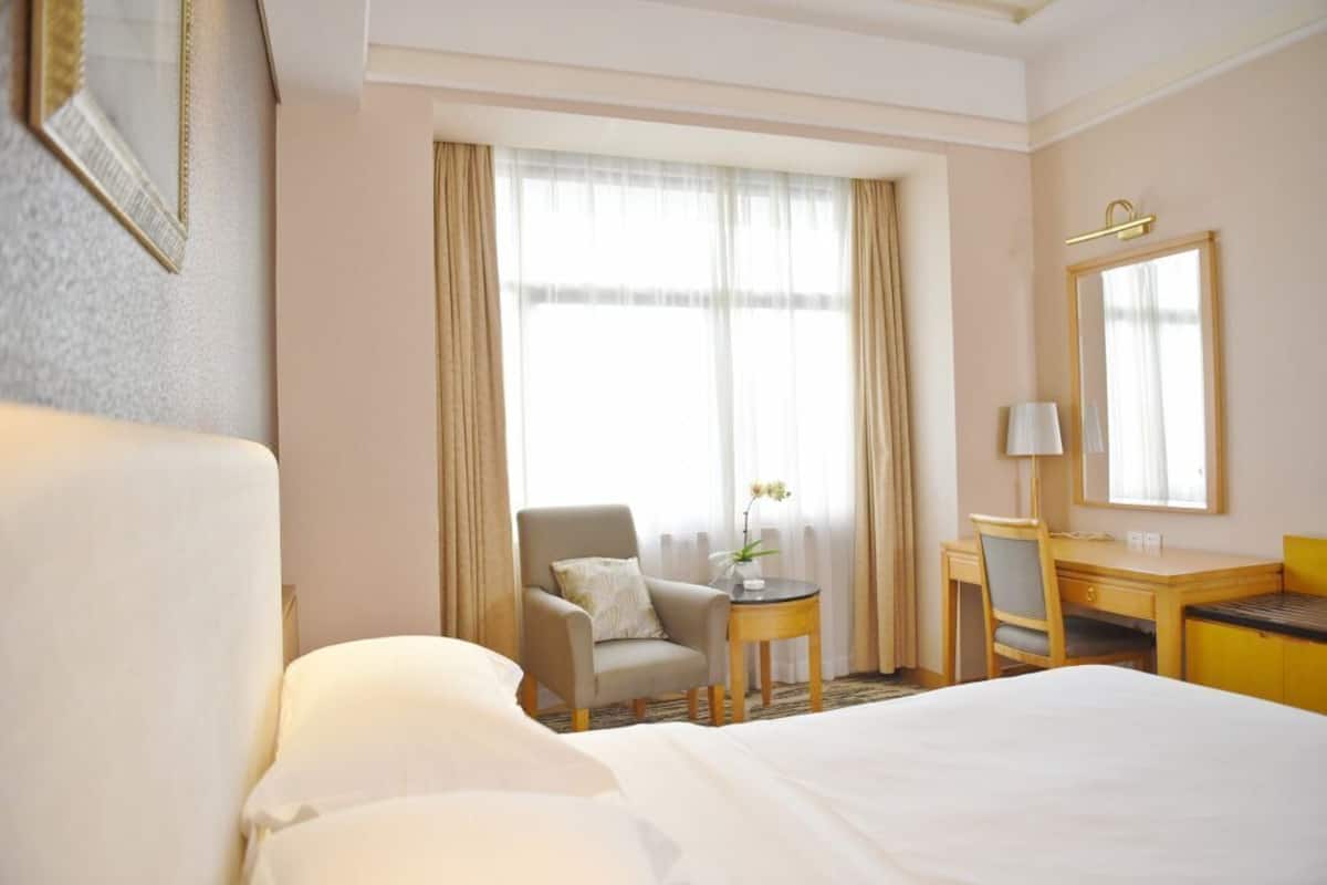 Ropa de cama de alta calidad y minibar