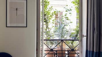 Family Quadruple Room | Premium bedding, minibar, in-room safe, individually decorated