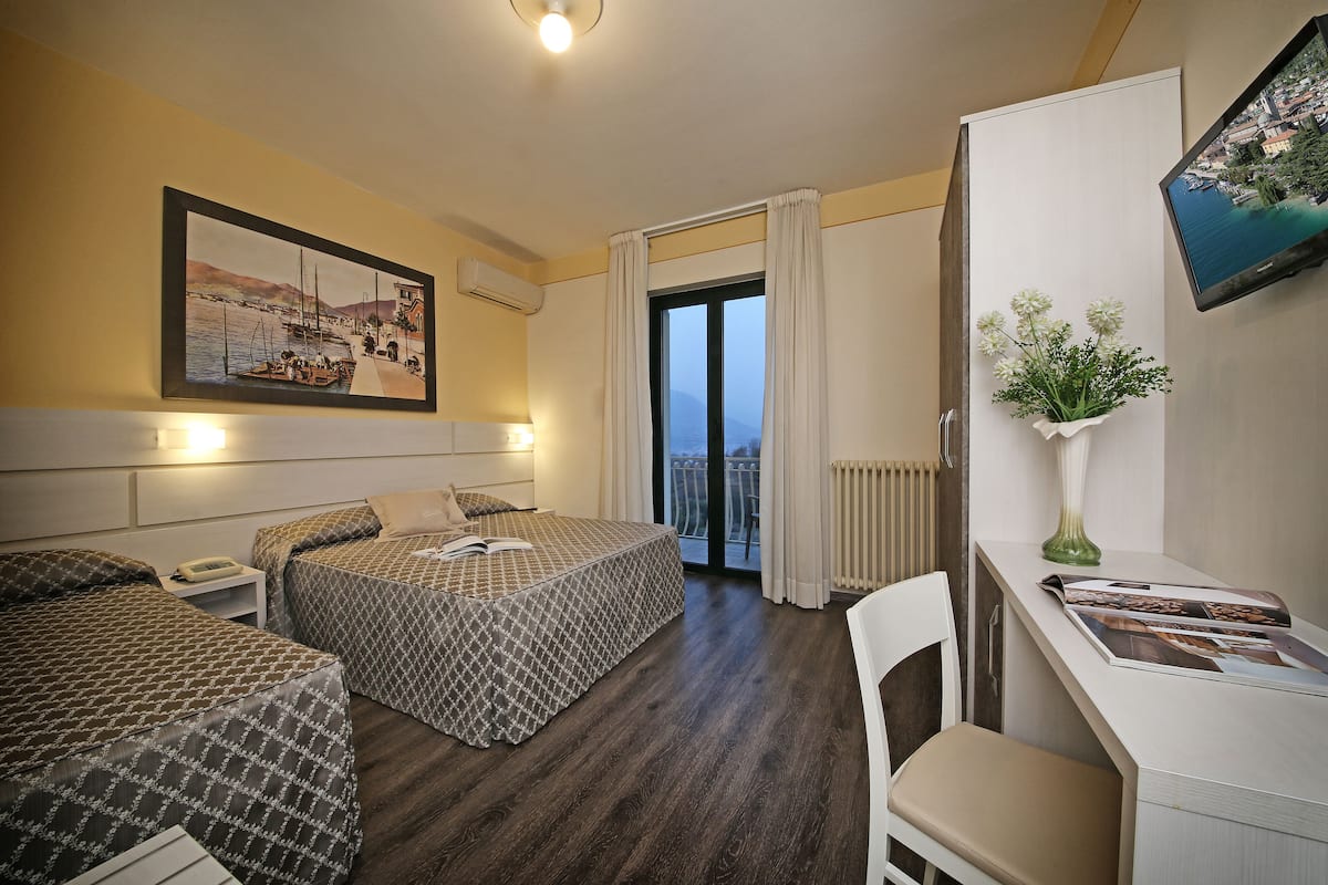 comfort triple room | in-room safe, desk, blackout curtains, soundproofing