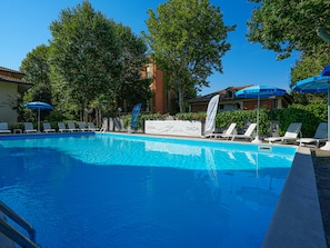 Outdoor pool, pool umbrellas, pool loungers