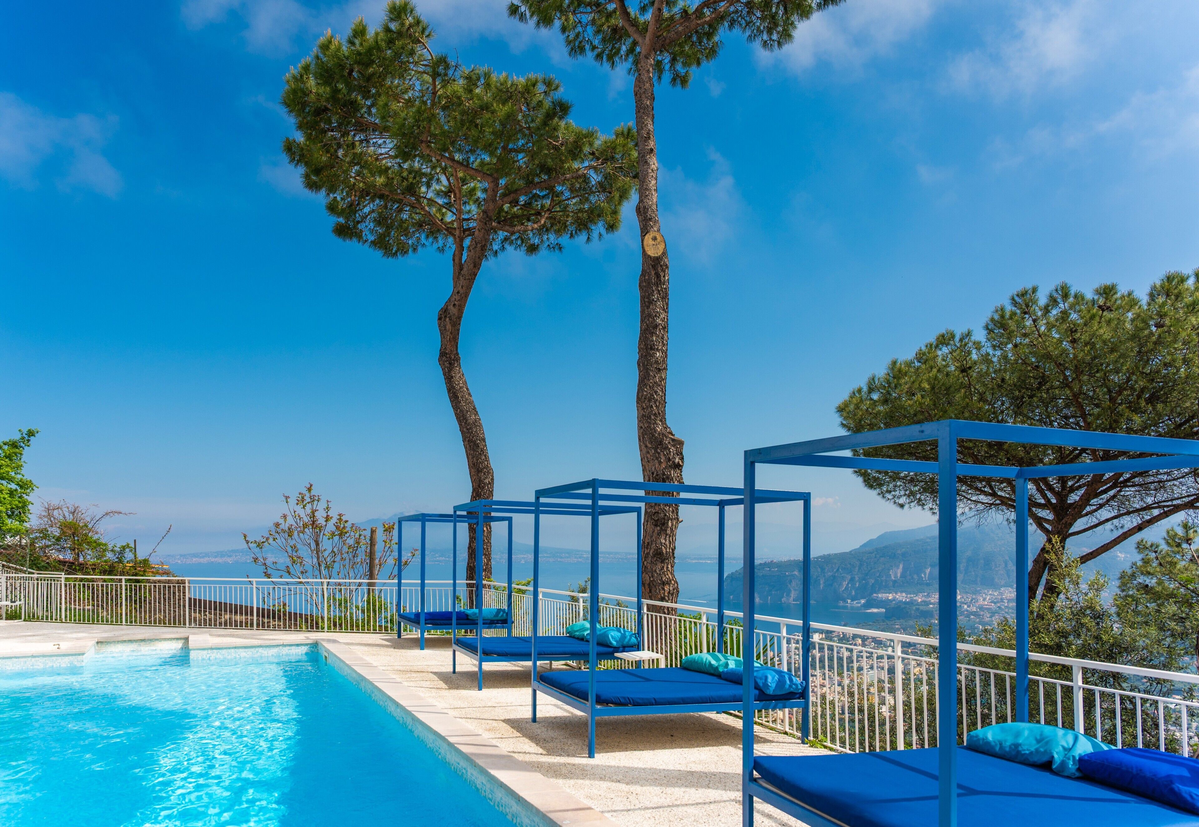Outdoor pool, open 8:00 AM to 8:00 PM, pool loungers