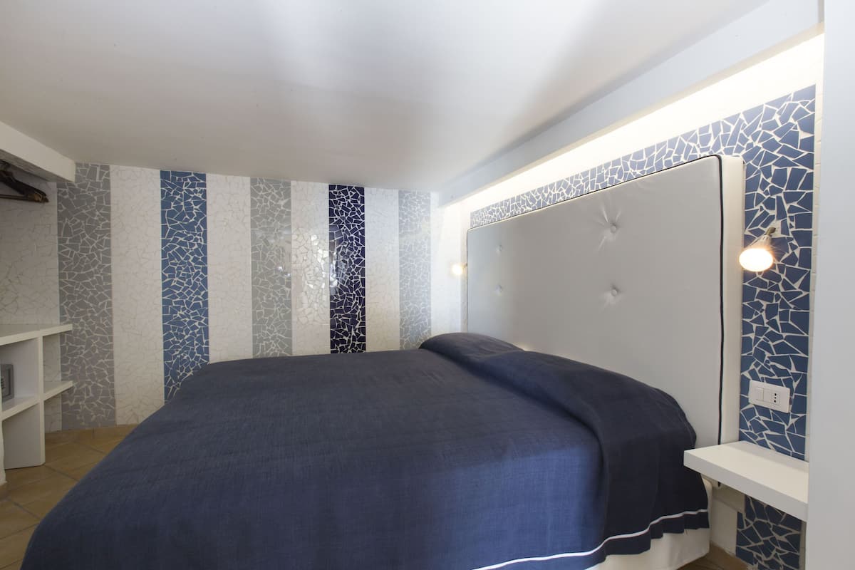 Apartment, 2 Bedrooms, Terrace, Sea View | Frette Italian sheets, premium bedding, down duvets, in-room safe