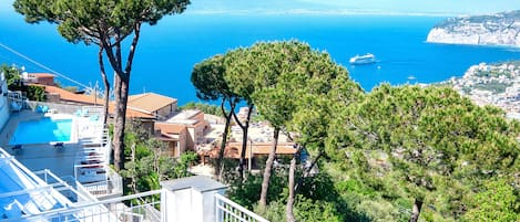 Outdoor pool, open 8:00 AM to 8:00 PM, sun loungers