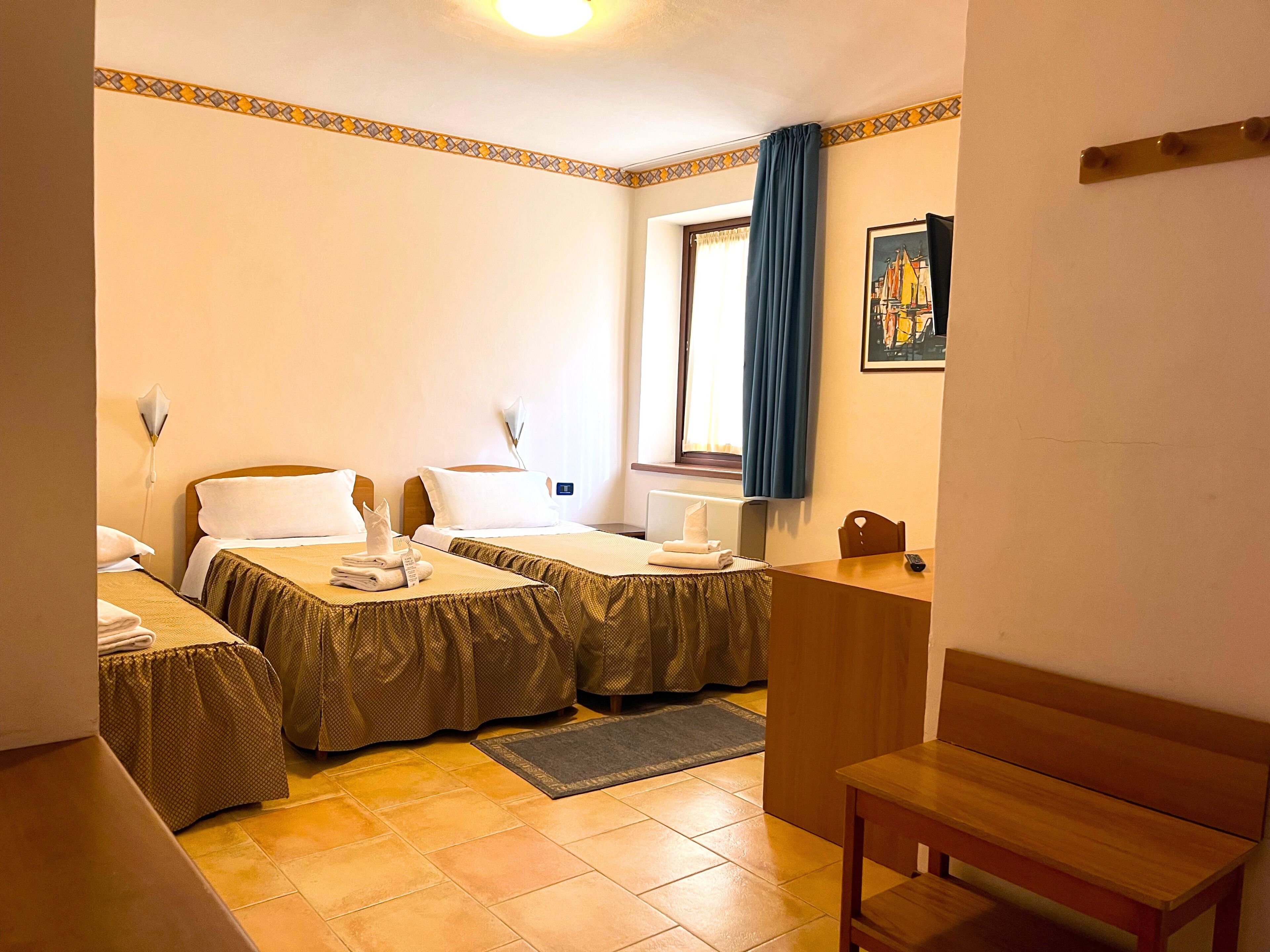 triple room | minibar, in-room safe, desk, blackout curtains